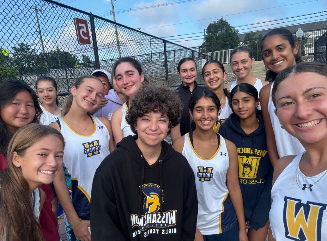 The girls’ tennis team at a preseason scrimmage